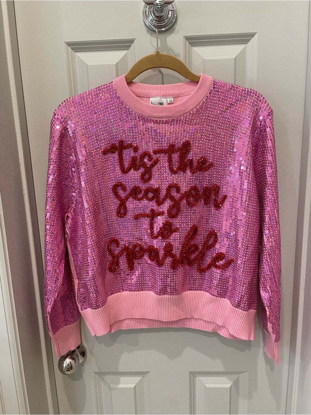 QUEEN OF SPARKLES Pink Sequin Holiday Sweatshirt with Red Script
